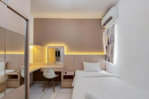 Cozy and Minimalist Studio (No Kitchen) at Aeropolis Apartment By Travelio